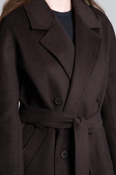 A women's short, double-breasted wool coat in dark brown by Estro.