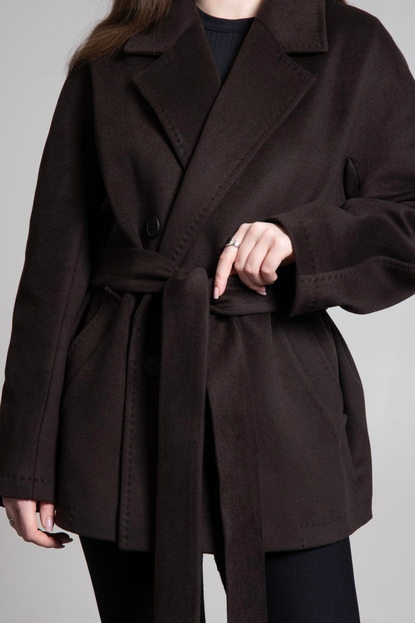 A short double-breasted coat for women, crafted from warm wool in a deep dark brown, by Estro.