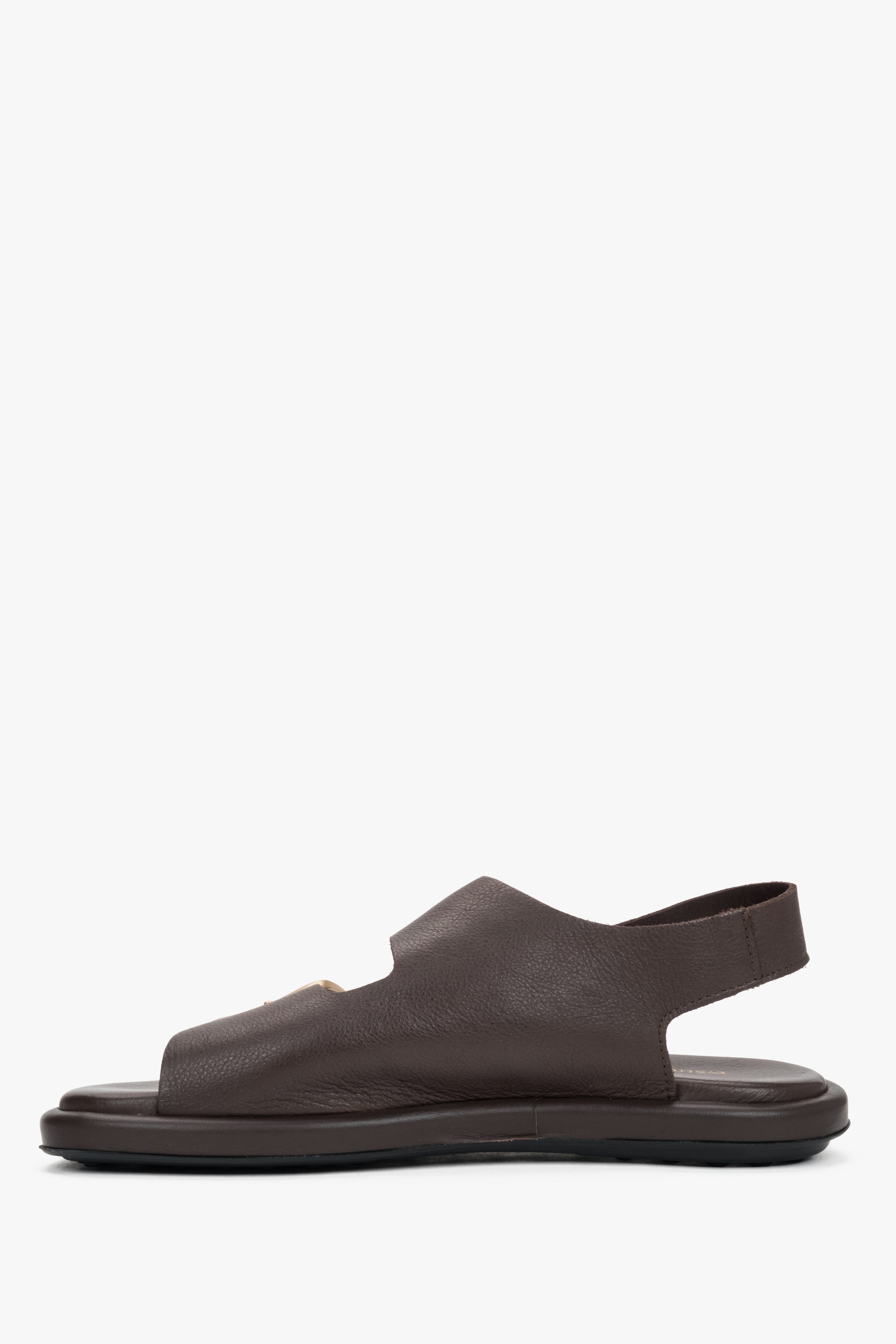 Women’s dark brown flat sandals with adjustable gold-tone buckles by Estro - side view.