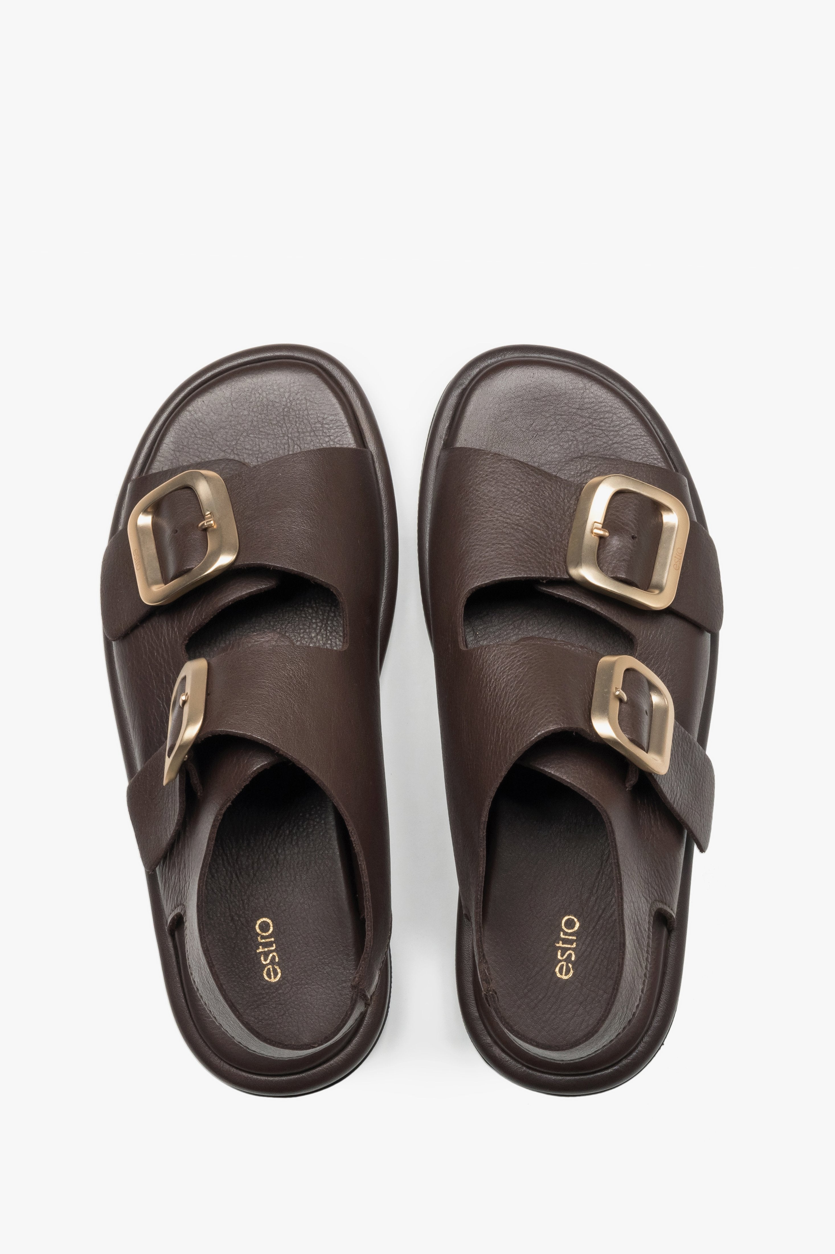 Women’s dark brown flat sandals with adjustable gold-tone buckles, Estro.