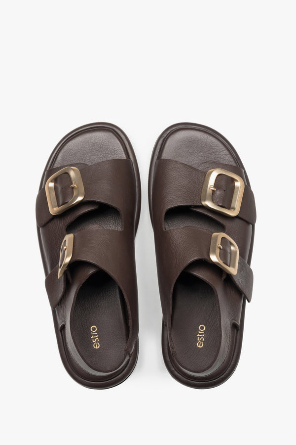 Women’s dark brown flat sandals with adjustable gold-tone buckles, Estro.