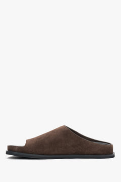 Dark brown women’s velour slide sandals on a flat sole.