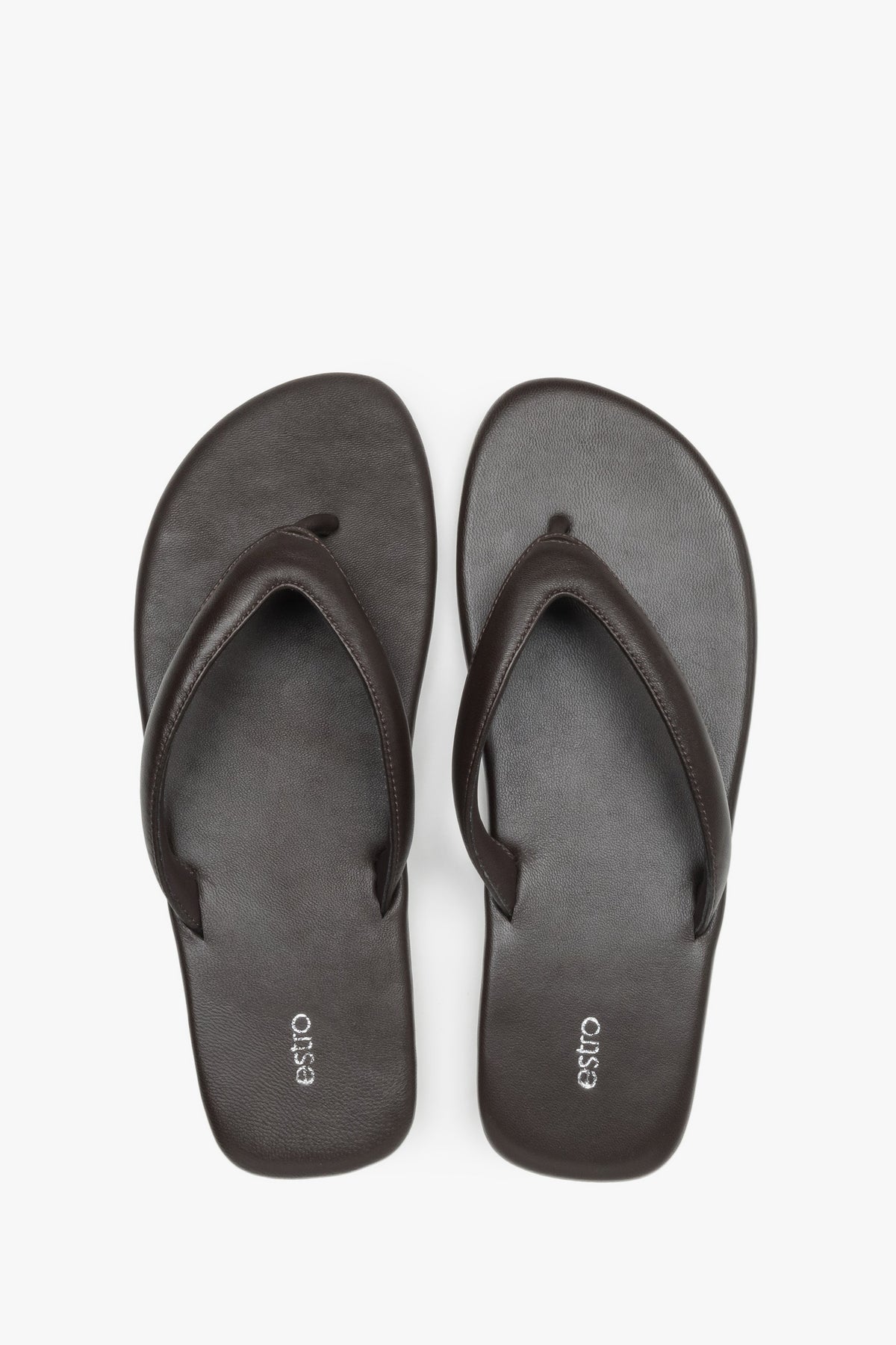 Women’s dark brown flip-flops made from soft genuine leather by Estro – top view.