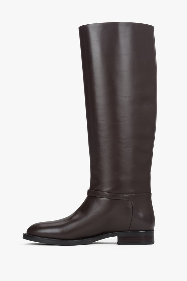 High dark brown women's boots made of genuine leather with a gold buckle.