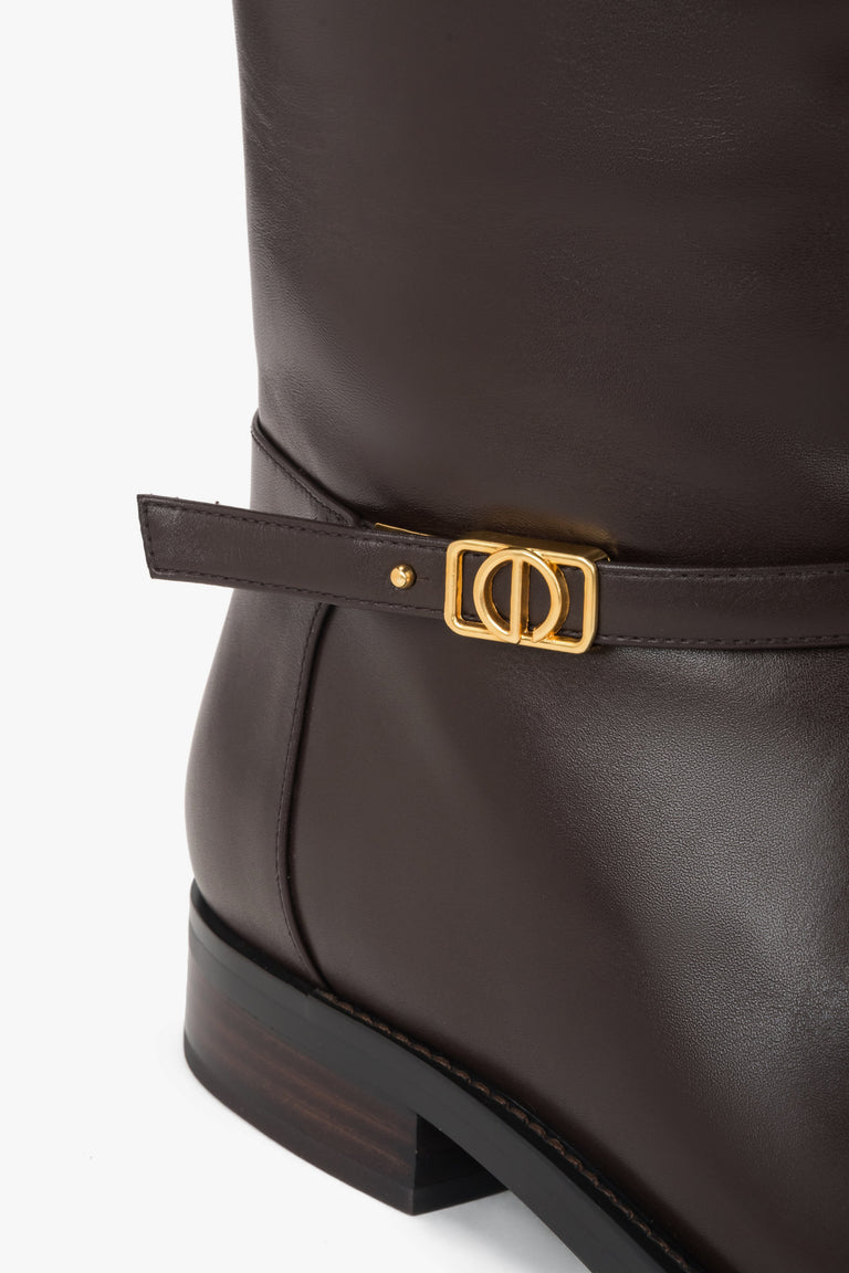 With a gold buckle – high dark brown women's genuine leather boots by Estro.