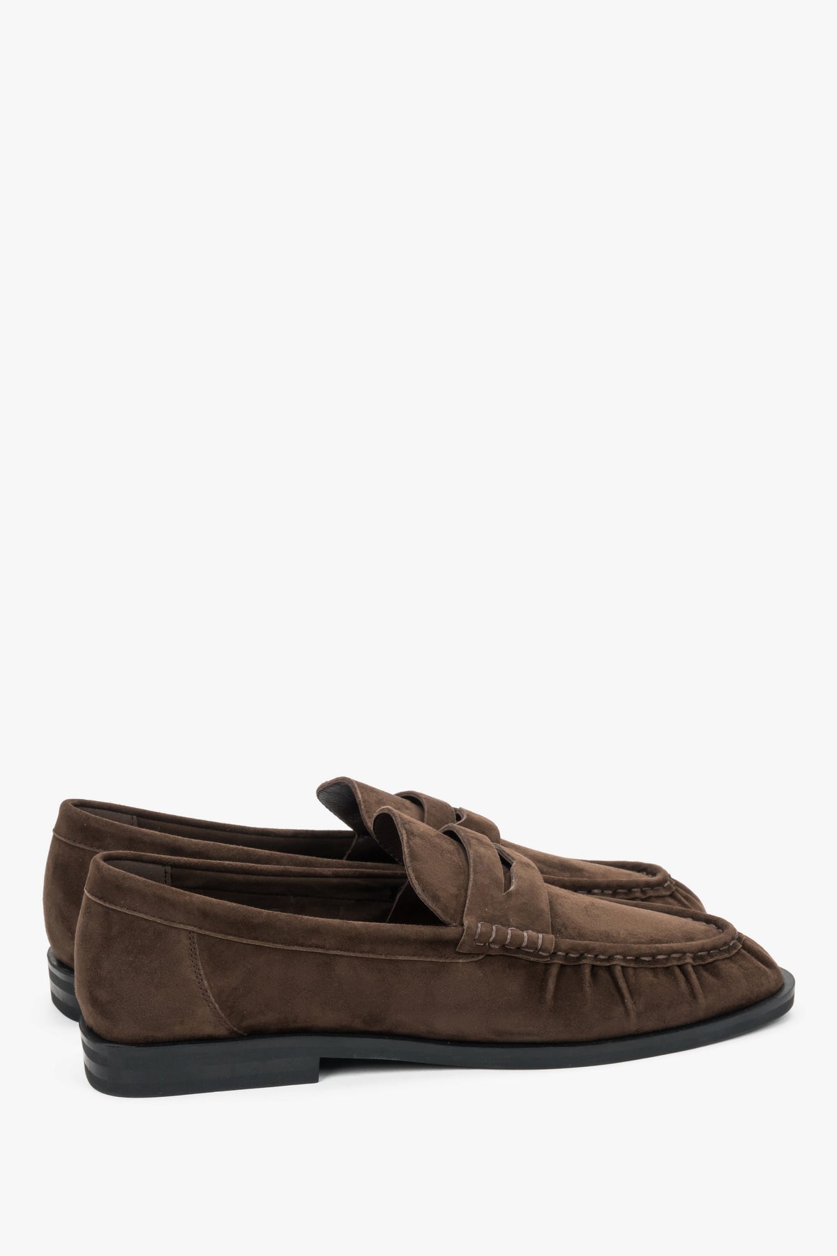 Dark brown women's loafers Estro, made of natural velour, with decorative stitching.