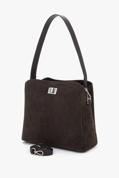 Women's dark brown suede handbag Estro - close-up view focusing on the rich velour grain and polished twist-lock clasp.