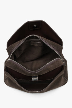 Women's dark brown natural suede shoulder bag featuring an elegant metallic turn-lock closure, Estro.