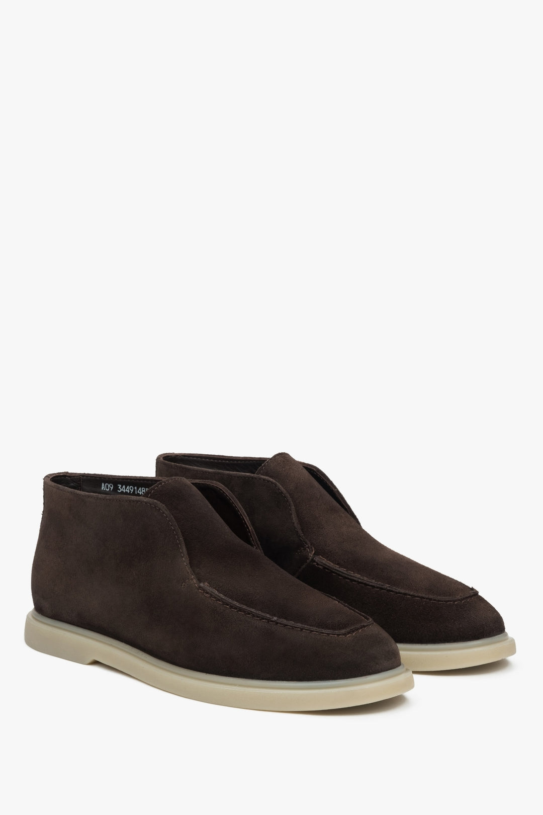 Dark brown slip-on women’s platform shoes by Estro.