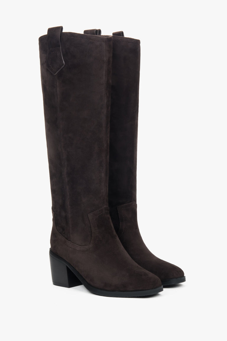 Dark brown women’s high cowboy boots made of natural velour.