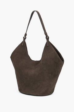 Dark brown hobo bag made from soft, premium Italian velour, featuring a relaxed silhouette and elegant magnetic closure for everyday style.