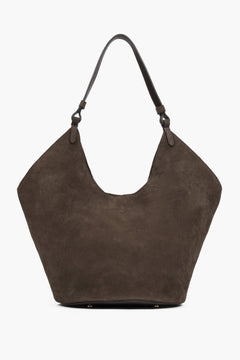 Sleek and spacious, this Estro hobo bag in rich brown velour combines luxury material with practical design, perfect for daily wear.
