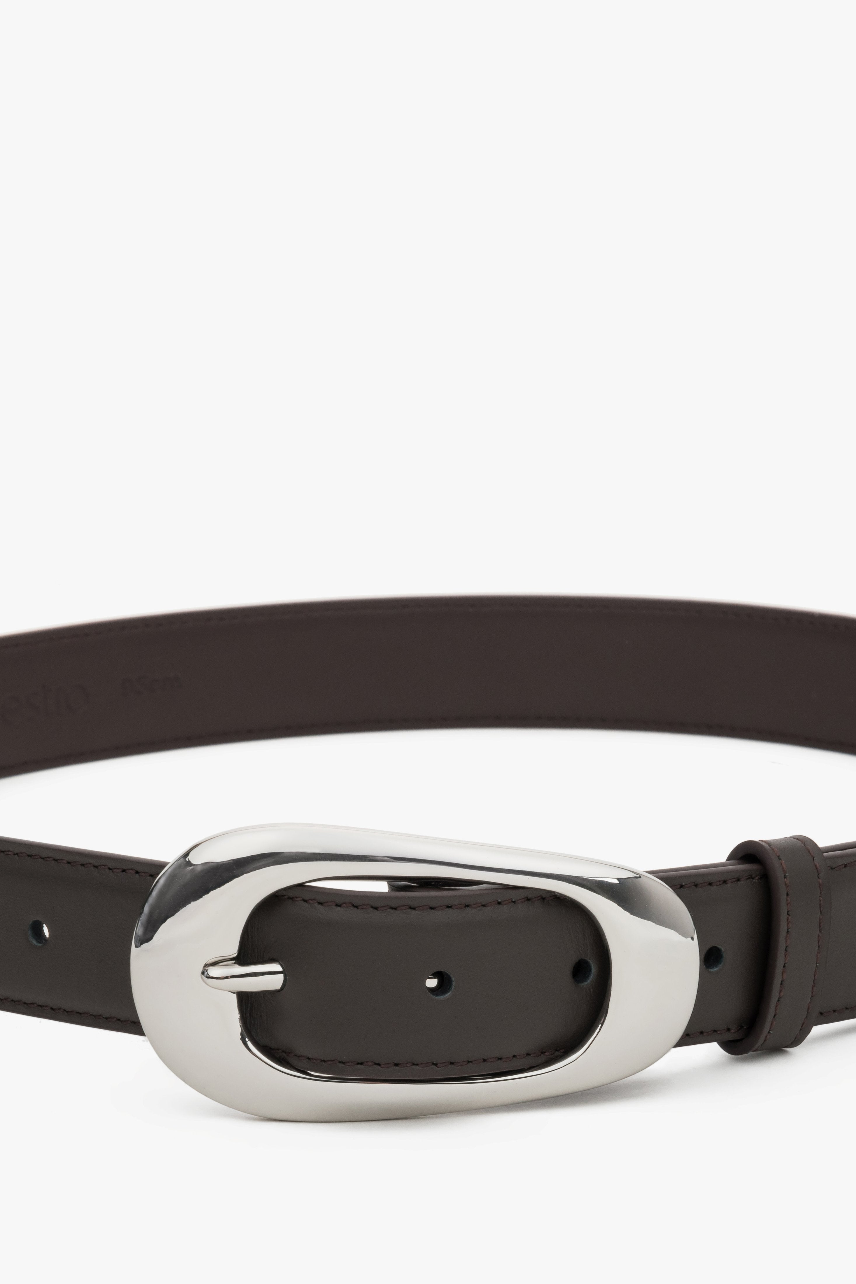 Close-up of smooth dark brown leather texture.