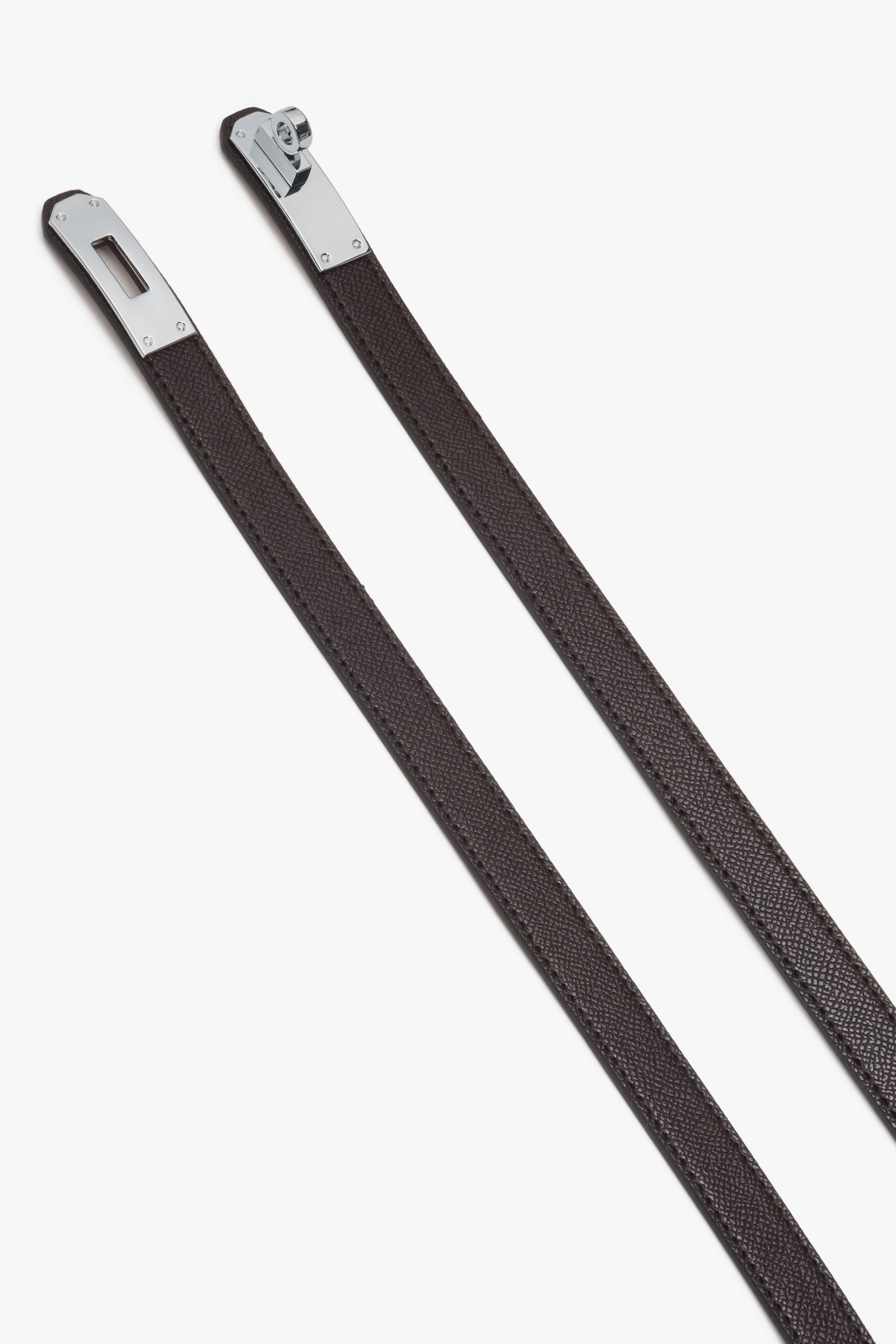 Dark brown women's leather belt with a silver buckle.