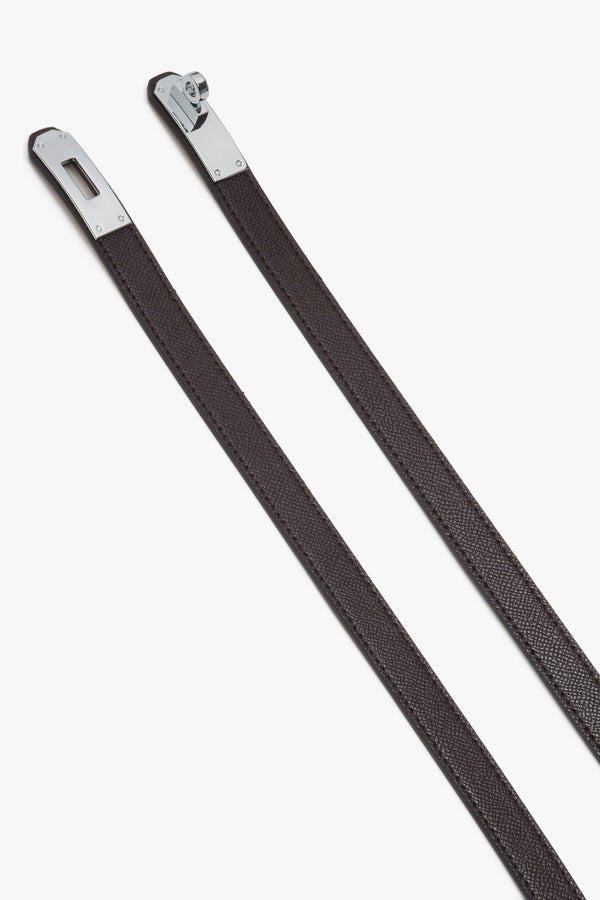 Dark brown women's leather belt with a silver buckle.