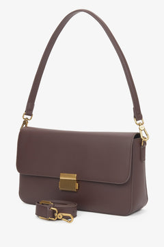 Women's dark brown genuine leather crossbody bag with gold hardware.
