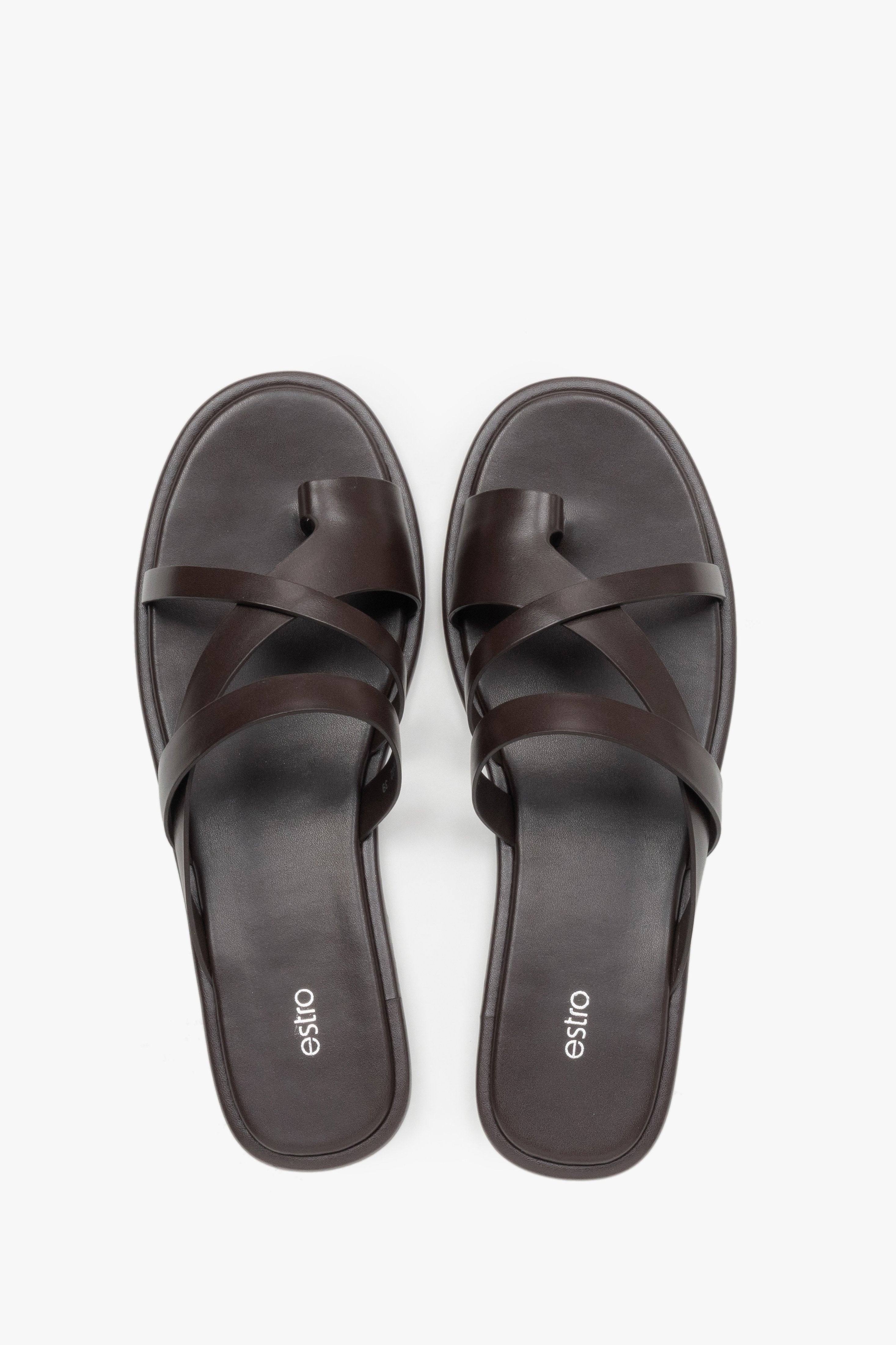 Women's minimalist dark brown leather slide sandals with soft interwoven straps.