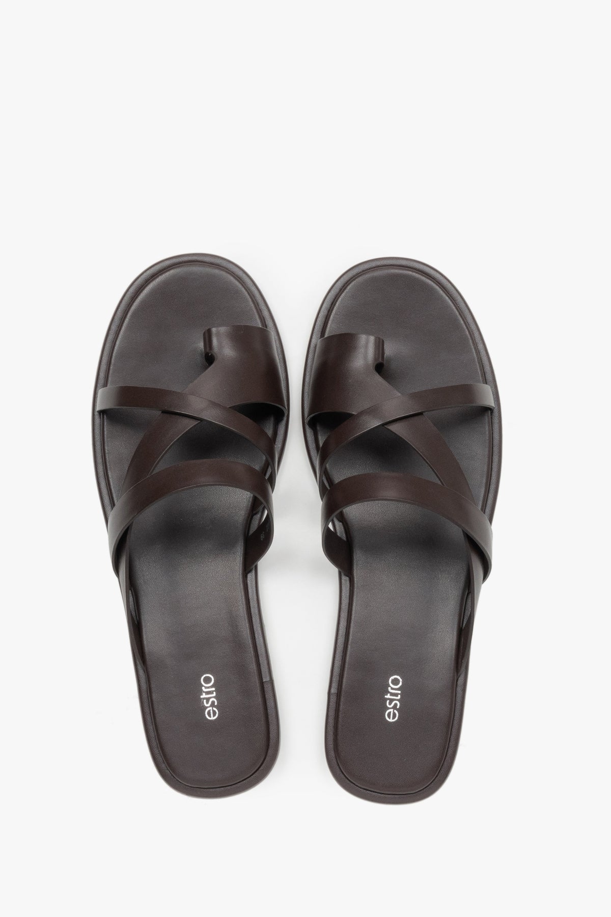 Women's minimalist dark brown leather slide sandals with soft interwoven straps.