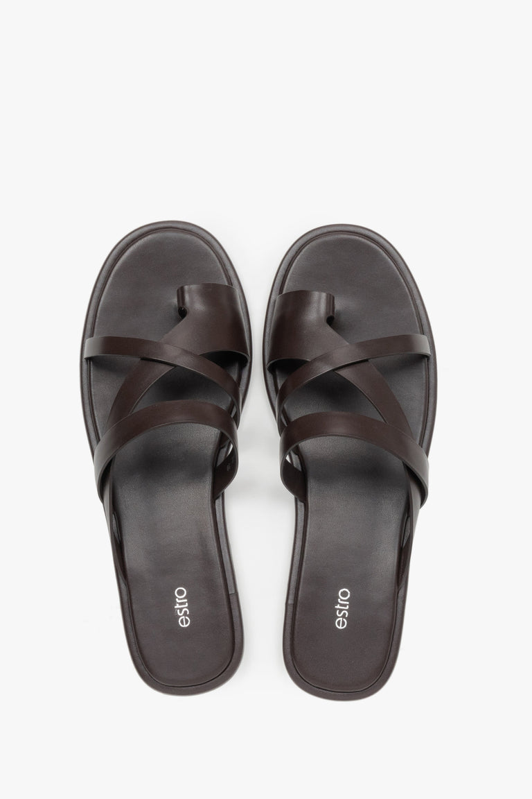 Women's minimalist dark brown leather slide sandals with soft interwoven straps.