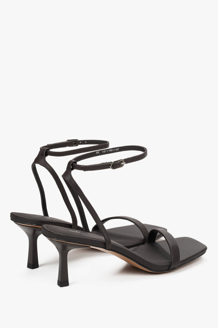 Detail of silver accents on women's dark brown Estro sandals