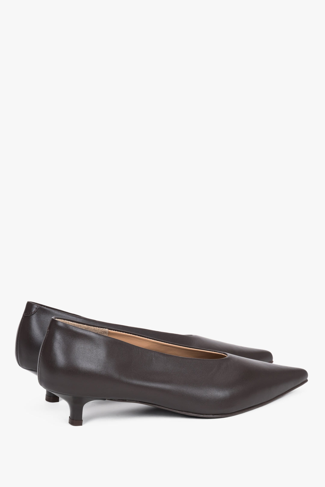 Detail view of the pointed toe and smooth dark brown leather finish.