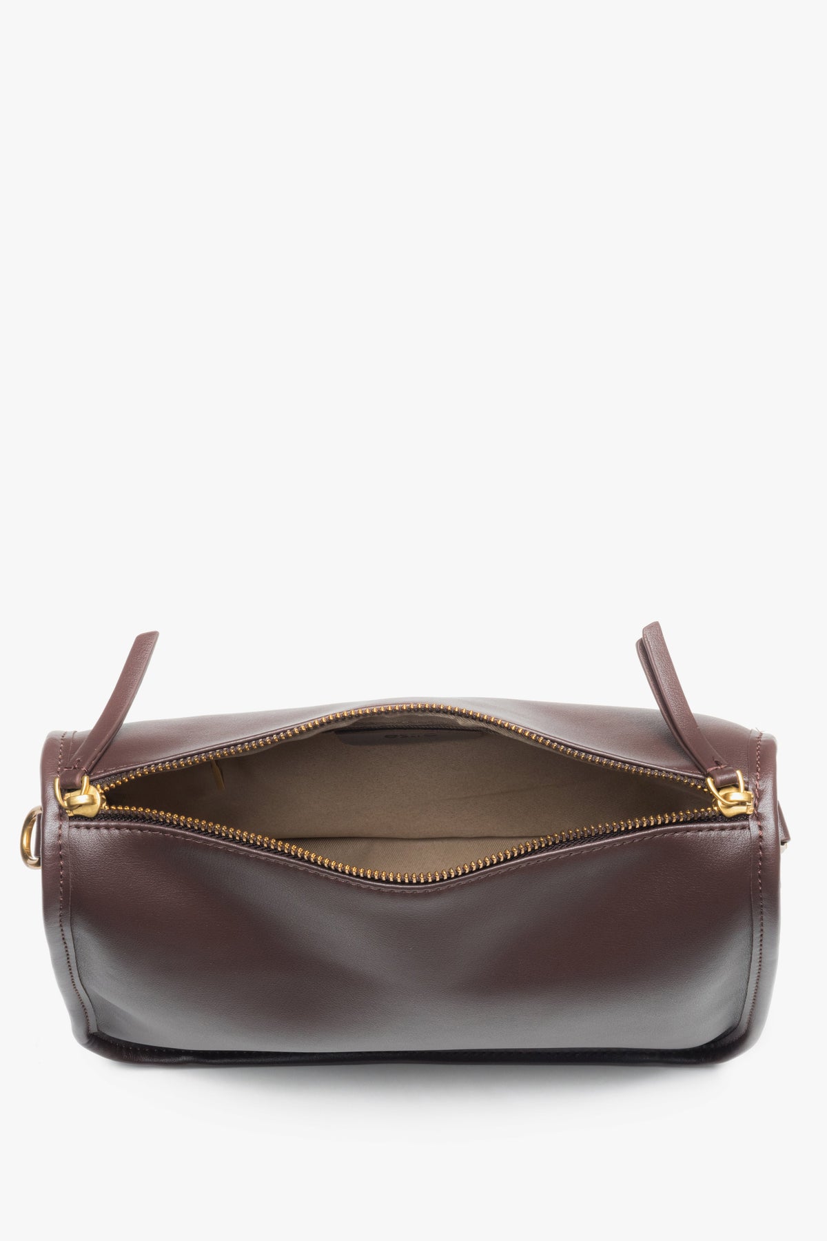 Dark brown leather women’s handbag with a wide strap.