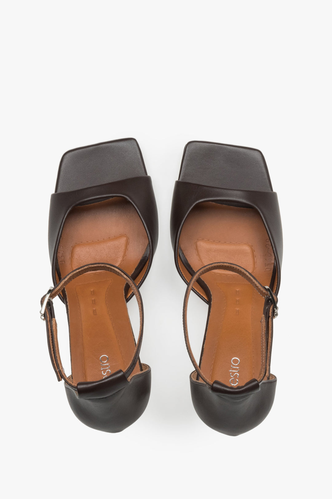 Women’s leather sandals with an open heel, featuring a modern square toe and an arrangement of soft straps - dark brown colour. 
