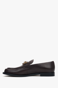 Dark brown women’s genuine leather loafers with a decorative buckle.
