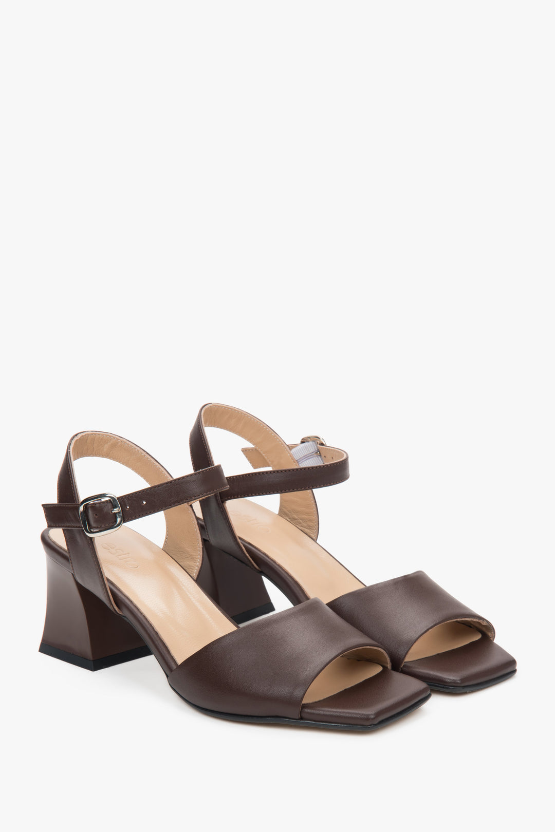 Dark brown leather sandals on a stable block heel with an adjustable buckle.