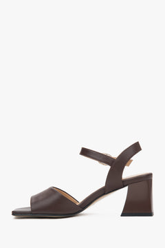 Dark brown women’s Estro leather block-heel sandals with an adjustable buckle.