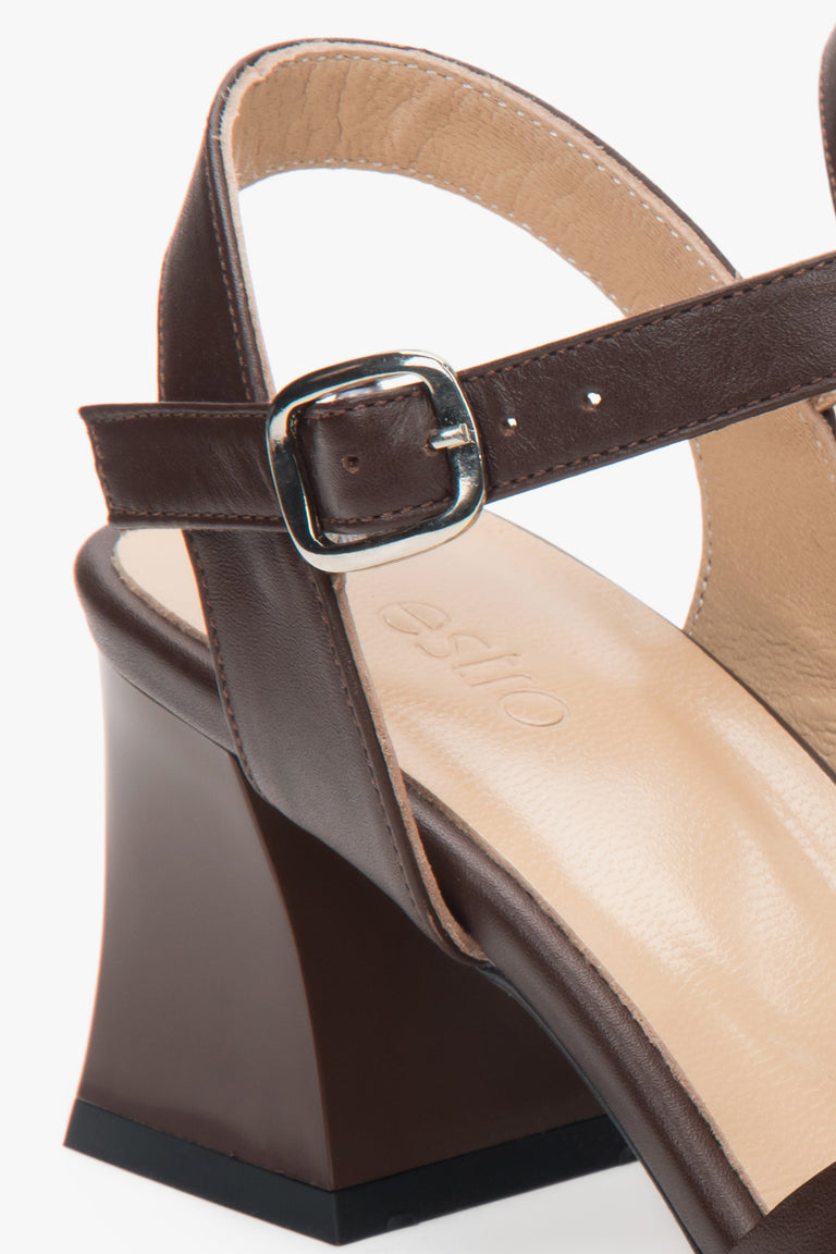 Dark brown women’s Estro leather block-heel sandals with an adjustable buckle.