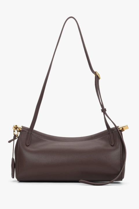 Compact leather shoulder bag featuring one main compartment and interior pocket.