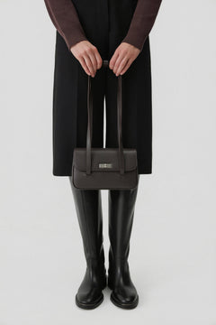 Women's dark brown leather shoulder bag with long handles and silver-tone hardware Estro.