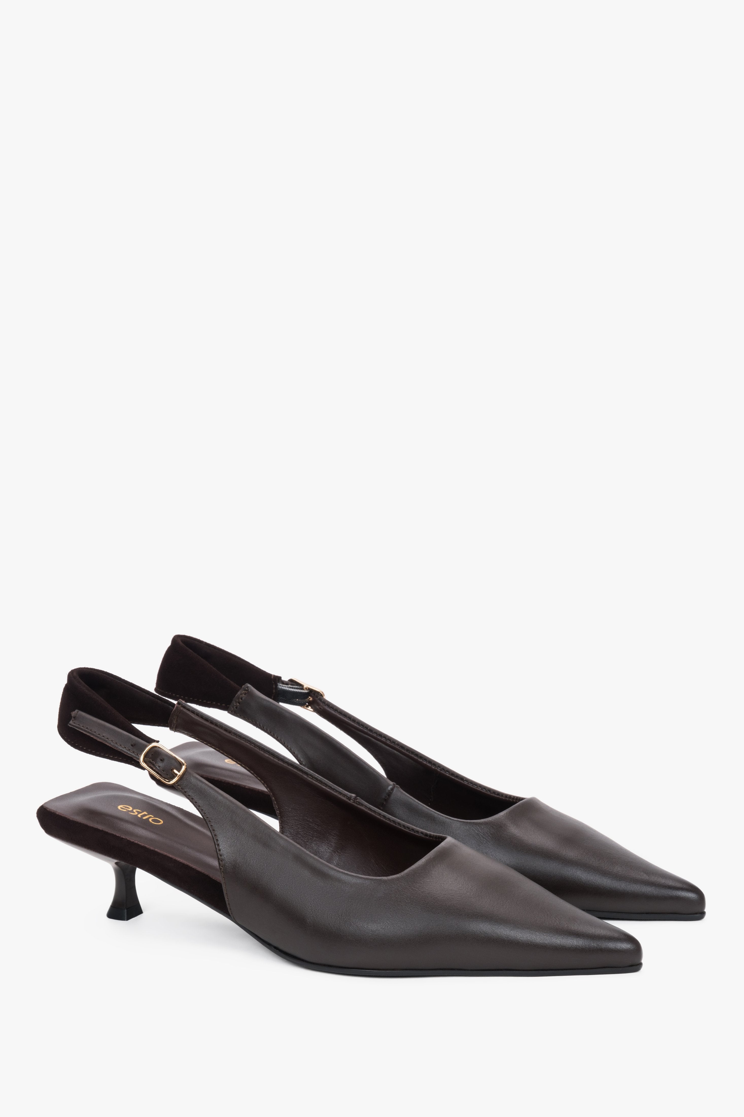 Women’s dark brown slingback pumps with a kitten heel.