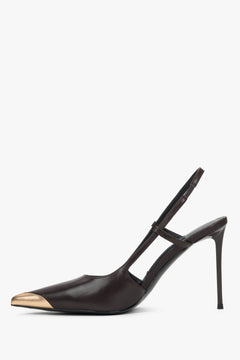 Low side view of women's dark brown leather slingback heels with gold toe
