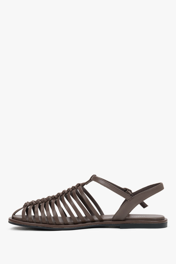 Elegant dark brown genuine leather closed-toe sandals with a flat heel.