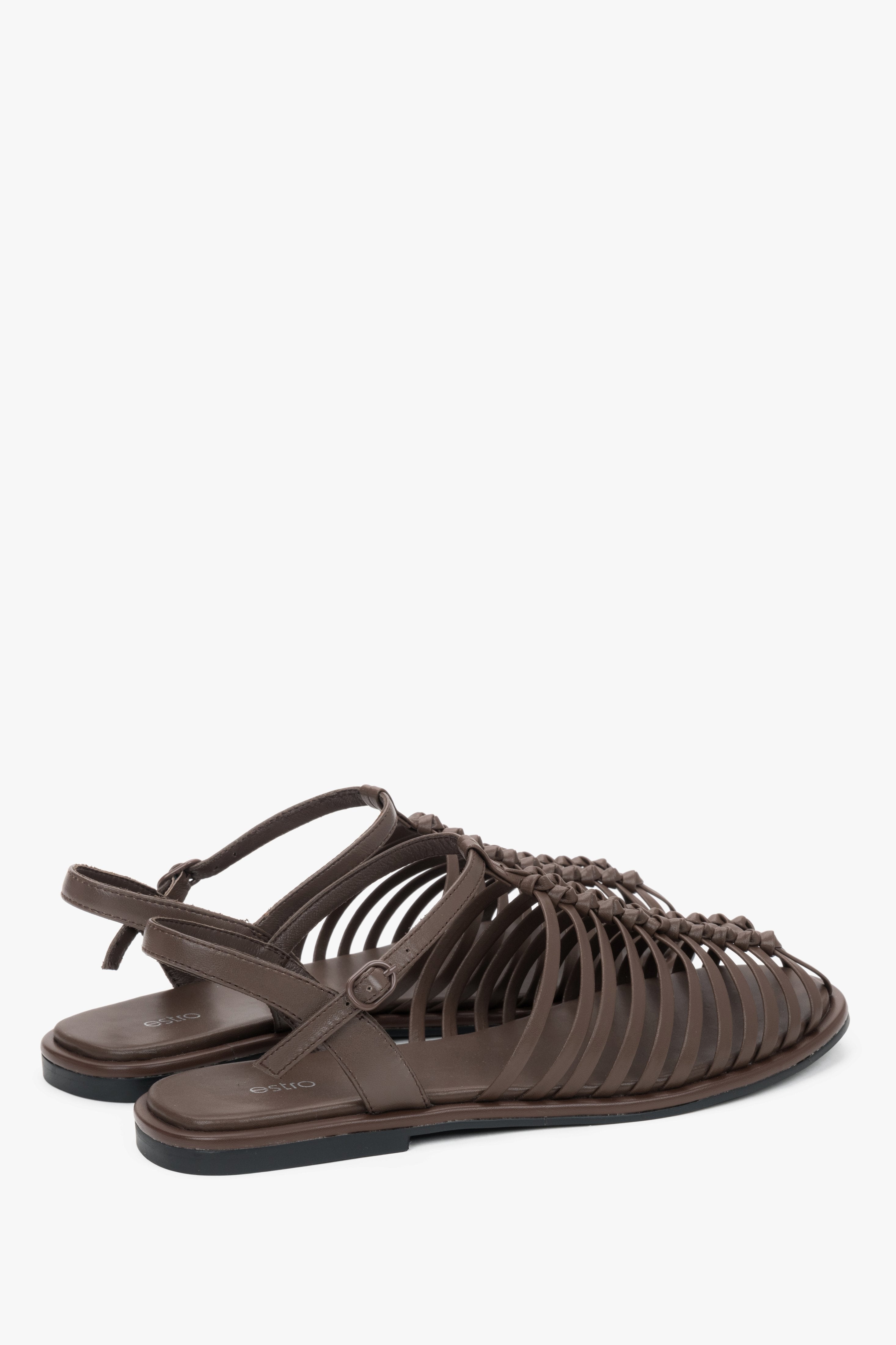 Estro dark brown leather cage sandals with a premium chevro insole.