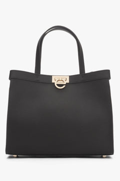 Elegant dark brown leather shoulder bag with sophisticated gold hardware.
