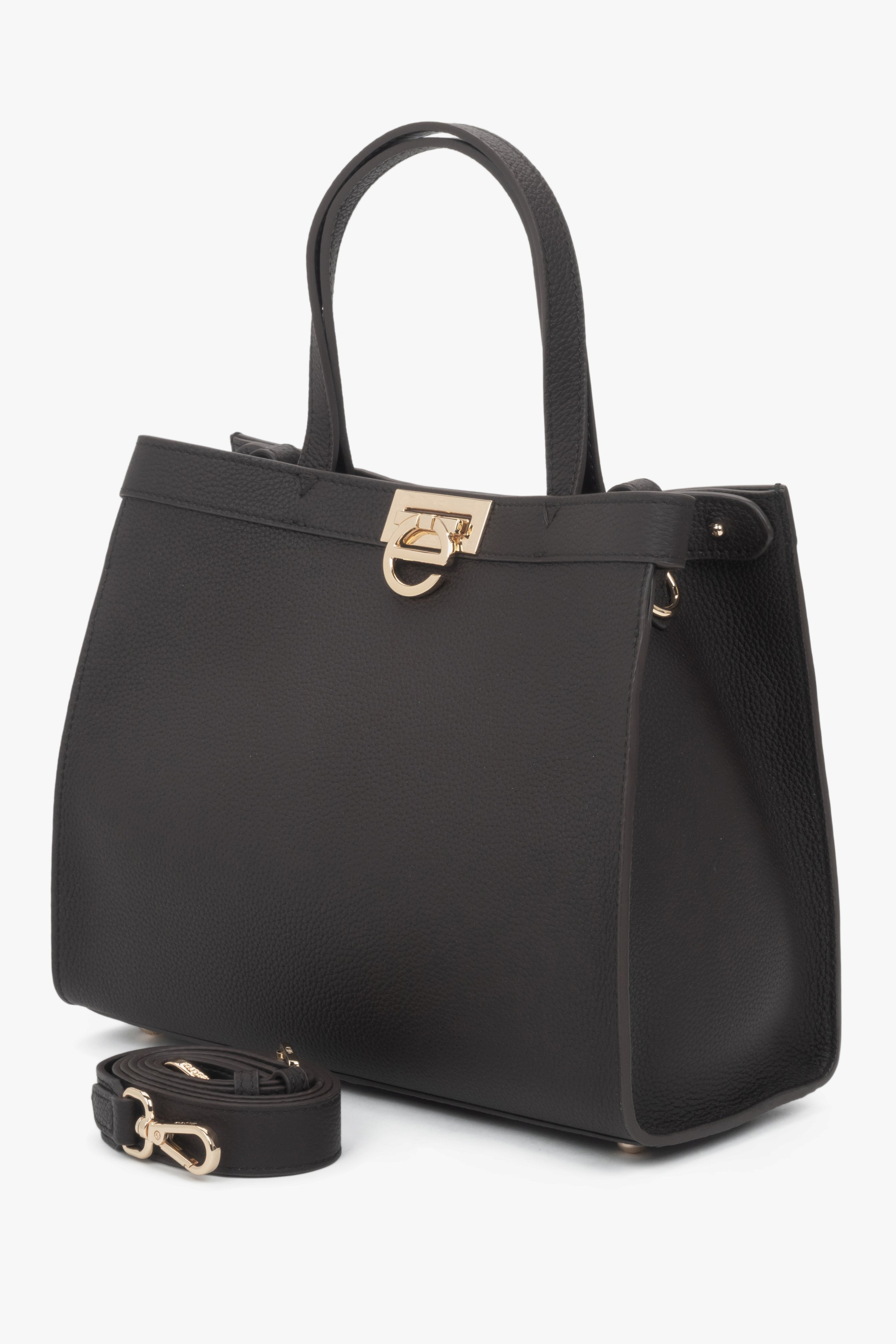 Structured silhouette with a secure buckle closure and logo-finished snap.