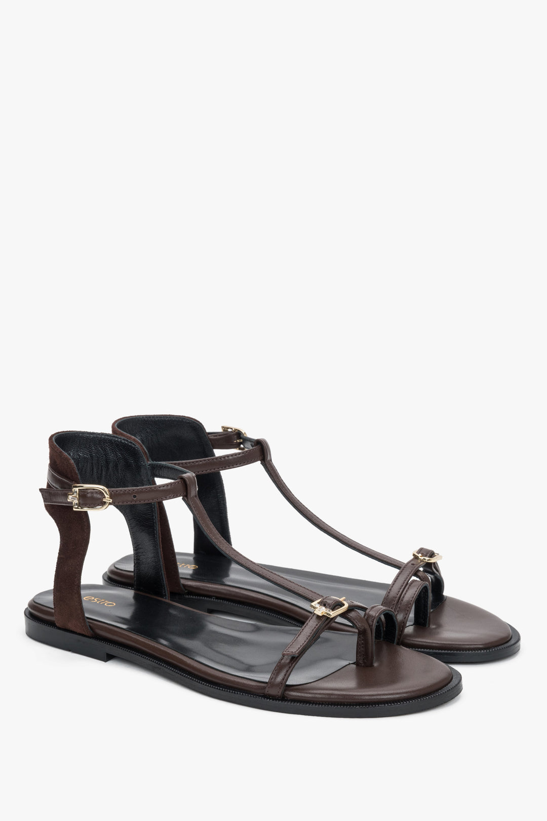 Side view of women's dark brown flat sandals with toe loop by Estro