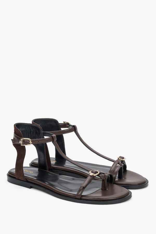 Side view of women's dark brown flat sandals with toe loop by Estro