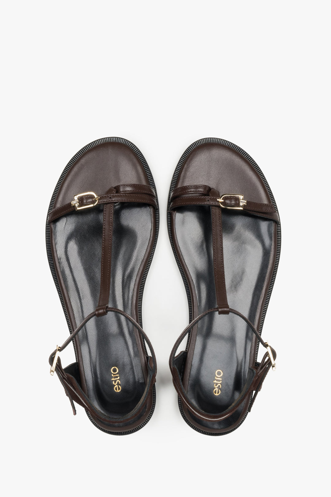 Top view of women's dark brown flat sandals by Estro