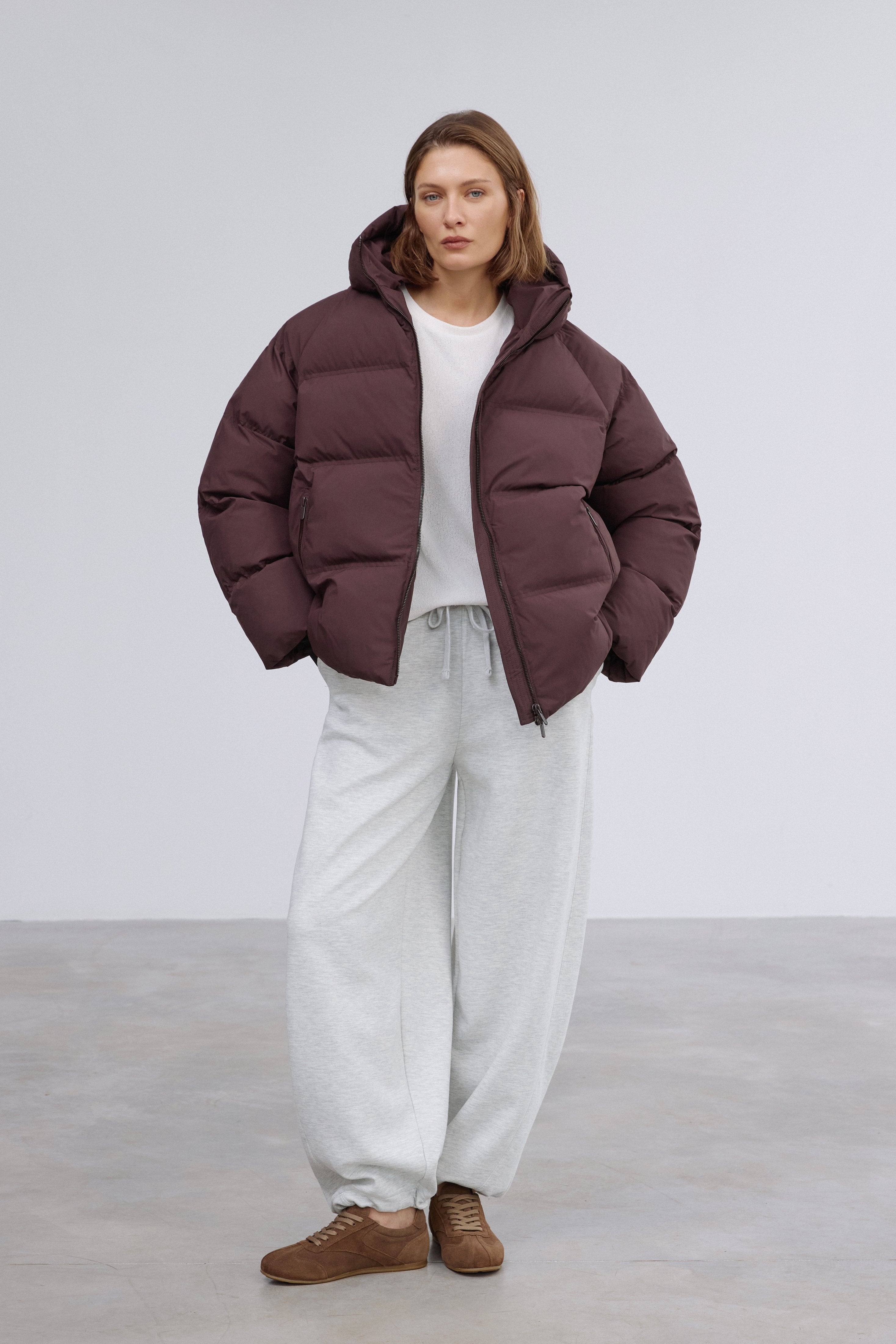 Side profile highlighting the modern loose fit and cozy eco-down filling.