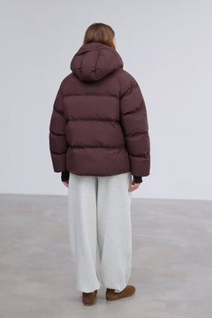 Full-length shot presenting the stylish loose-fit cut and minimalist design.