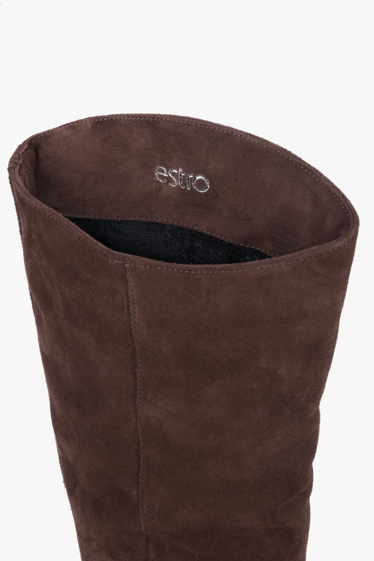 Dark brown women’s knee-high boots made of natural velour with a low heel – details.