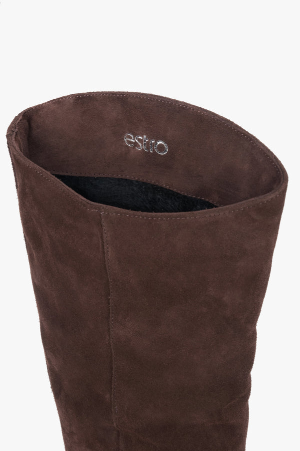 Dark brown women’s knee-high boots made of natural velour with a low heel – details.