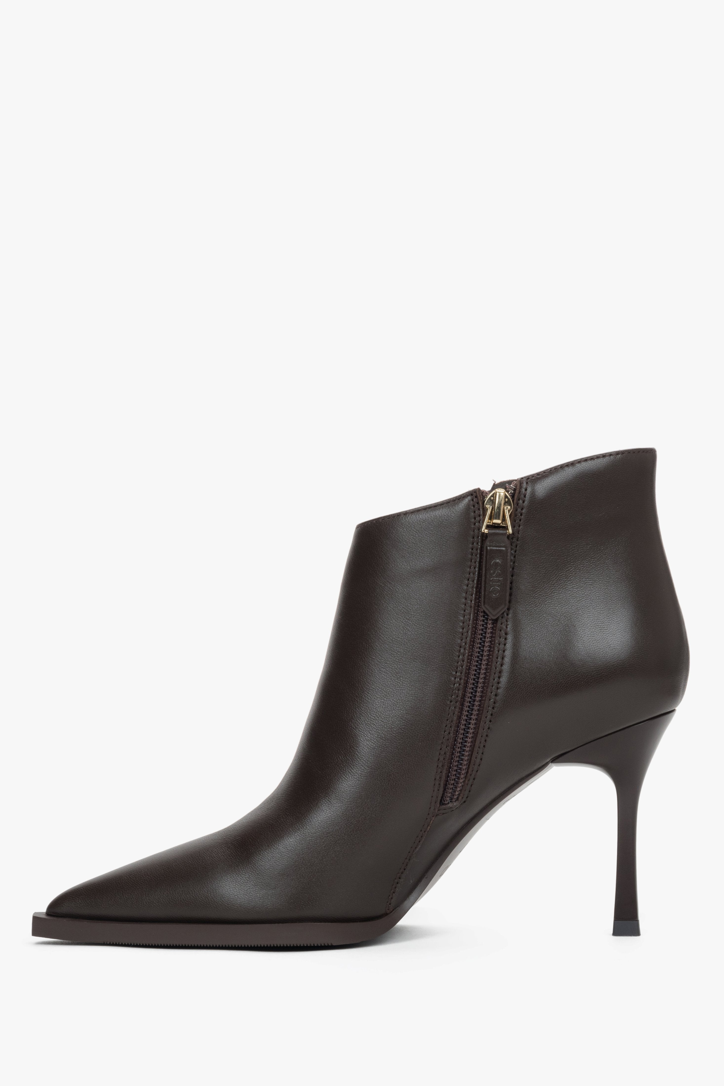 Dark brown women’s high-heeled ankle boots in genuine leather with a pointed toe.