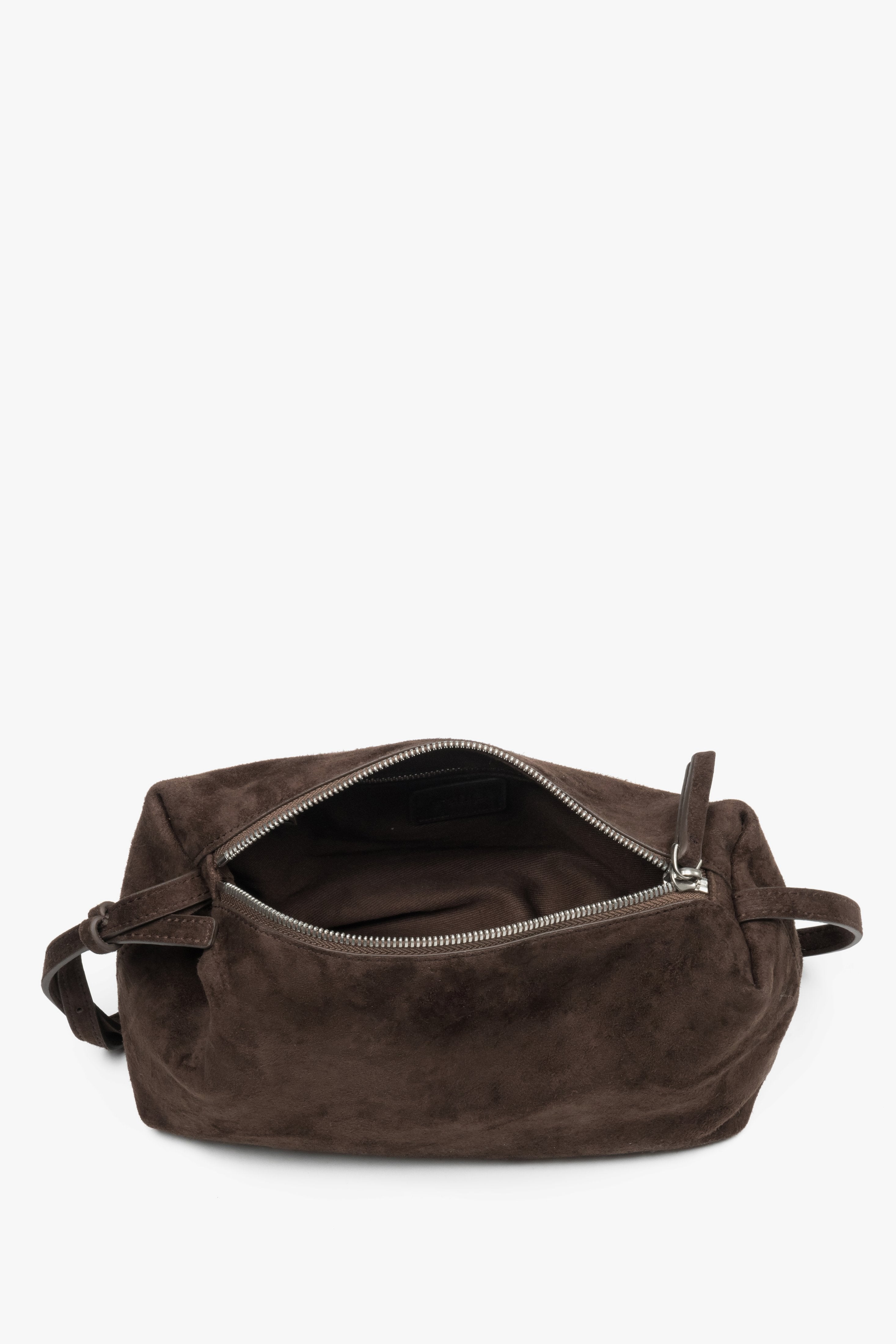 Close-up of soft dark brown natural velour texture.