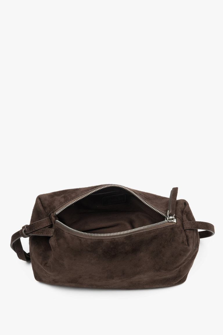 Close-up of soft dark brown natural velour texture.