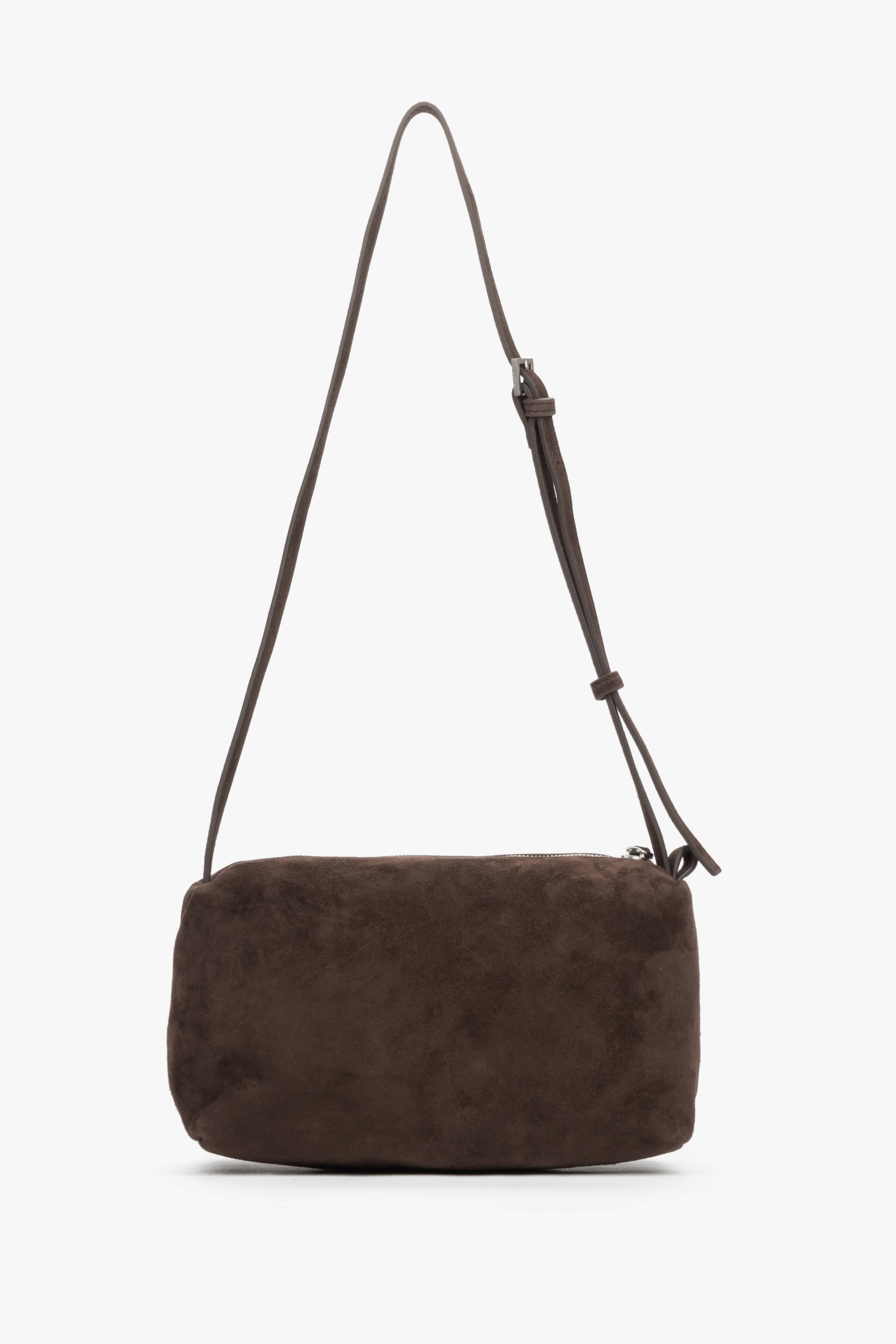 Back view of women's dark brown velour messenger bag.
